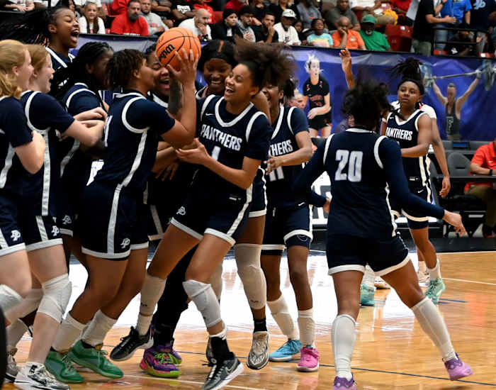 Orlando Dr. Phillips players celebrate after three-peating as the FHSAA Class 7A state champions on Saturday at The RP Funding Center.